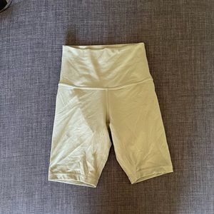Green Lululemon biking shorts (size 4, inseam 8’)